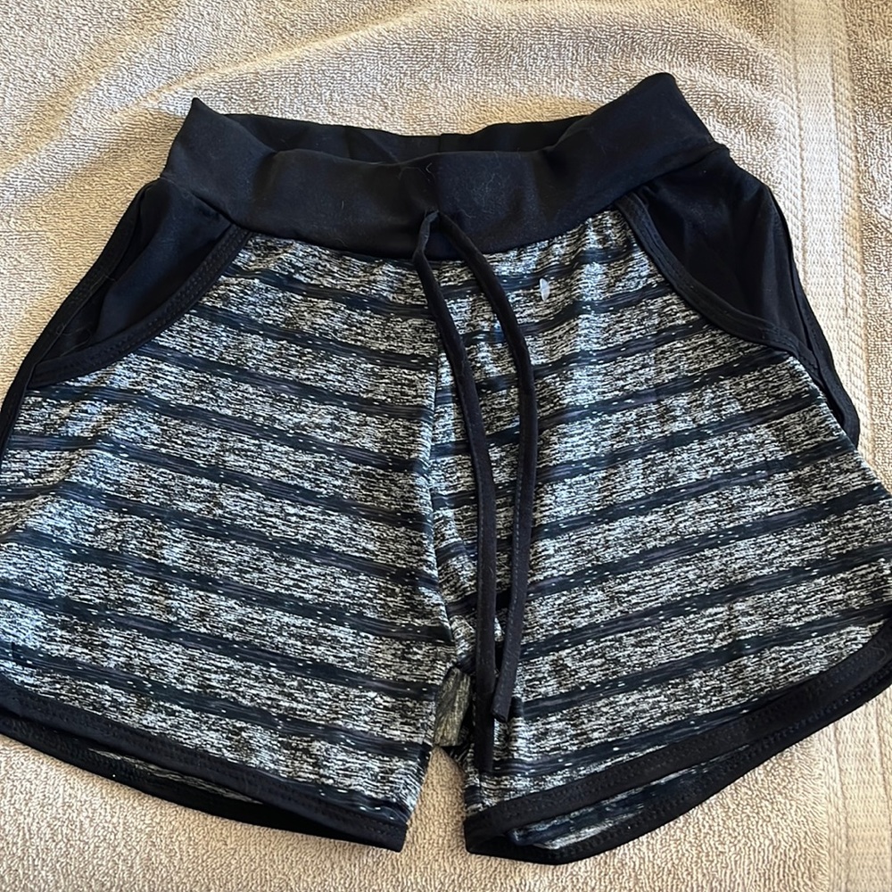 Striped black and gray from baby size small shorts.